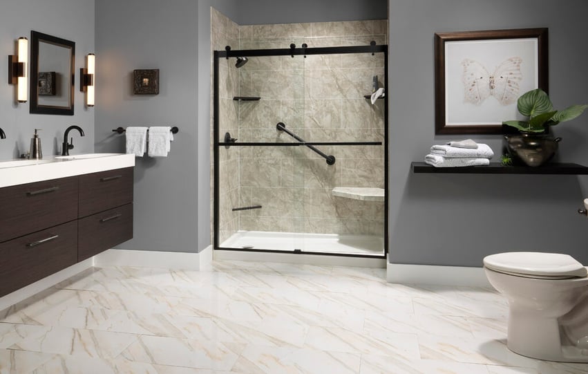 Photo of a spacious bathroom with an acrylic walk in shower that has built in shower seating and grab bars