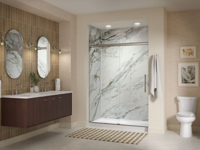 Photo of a KOHLER Calacatta Gold LuxStone acrylic walk in shower