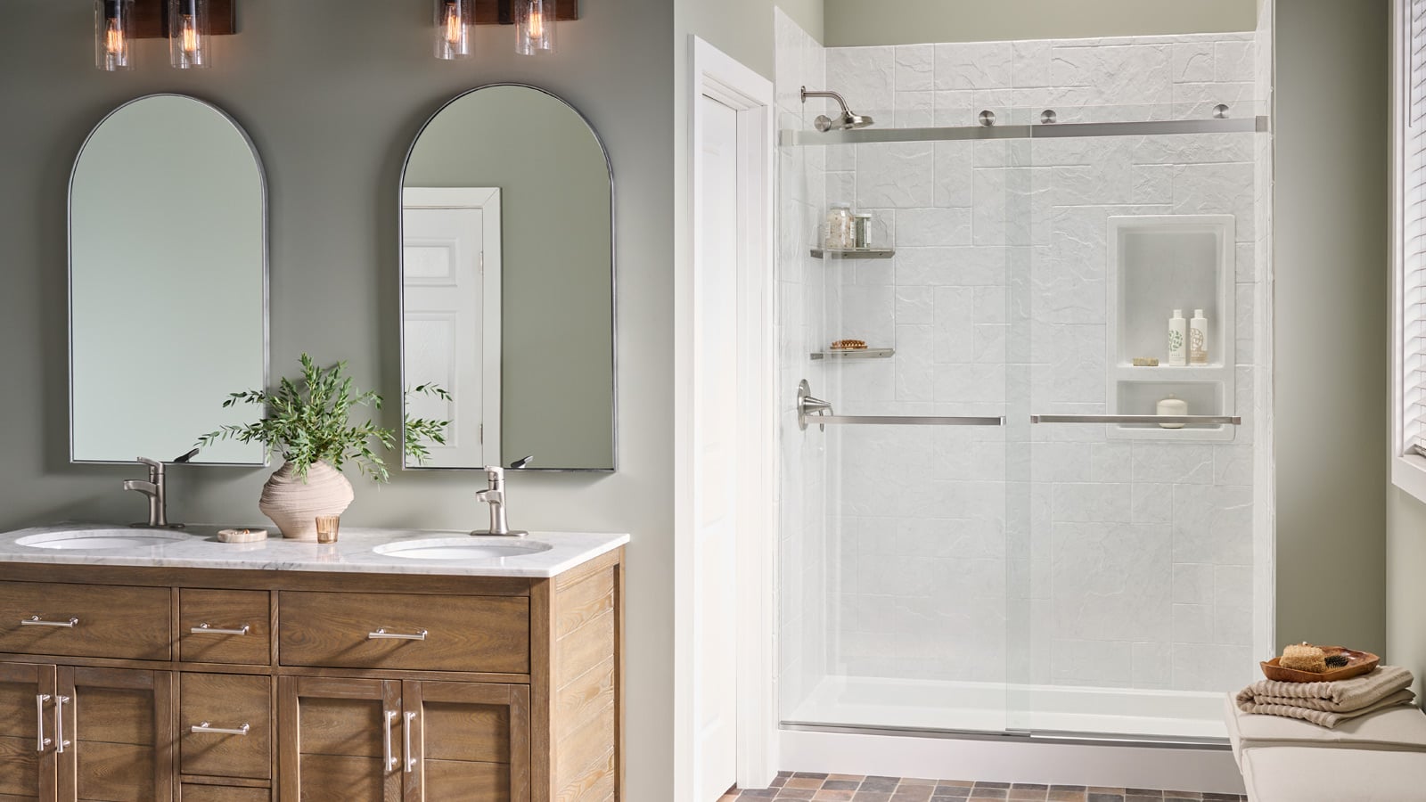 Photo of a walk in shower with Jacuzzi acrylic walls and sliding glass doors