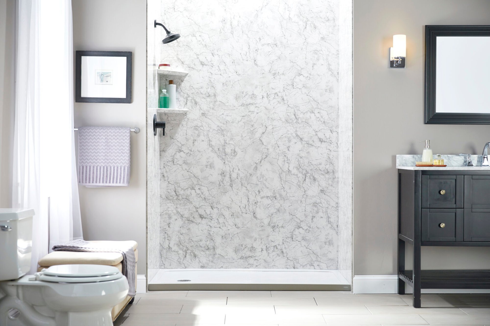Photo of a walk in shower with a low threshold and corner shelves