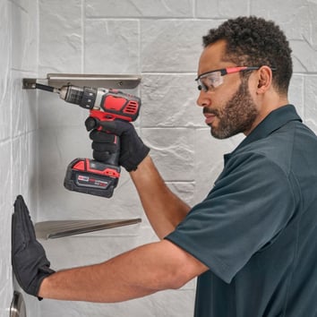 Installing shower accessories like corner caddy shelves
