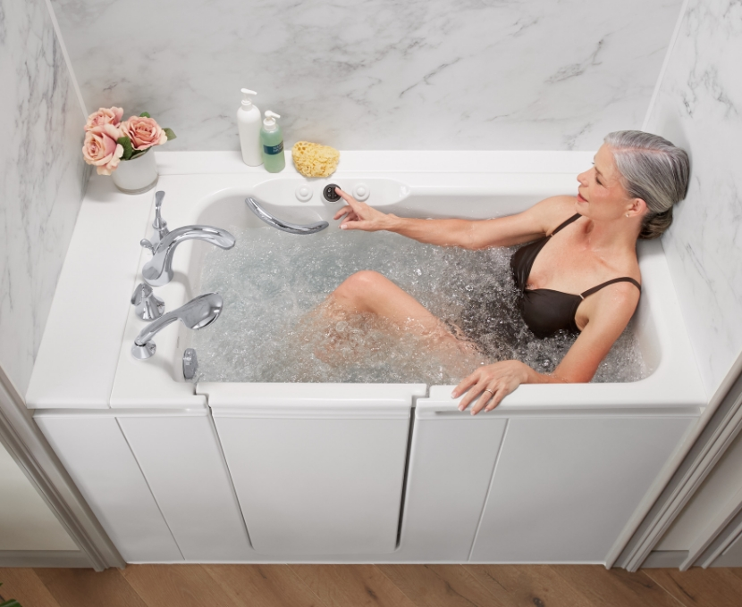 Photo of a woman in a hydromassage walk in bath tub