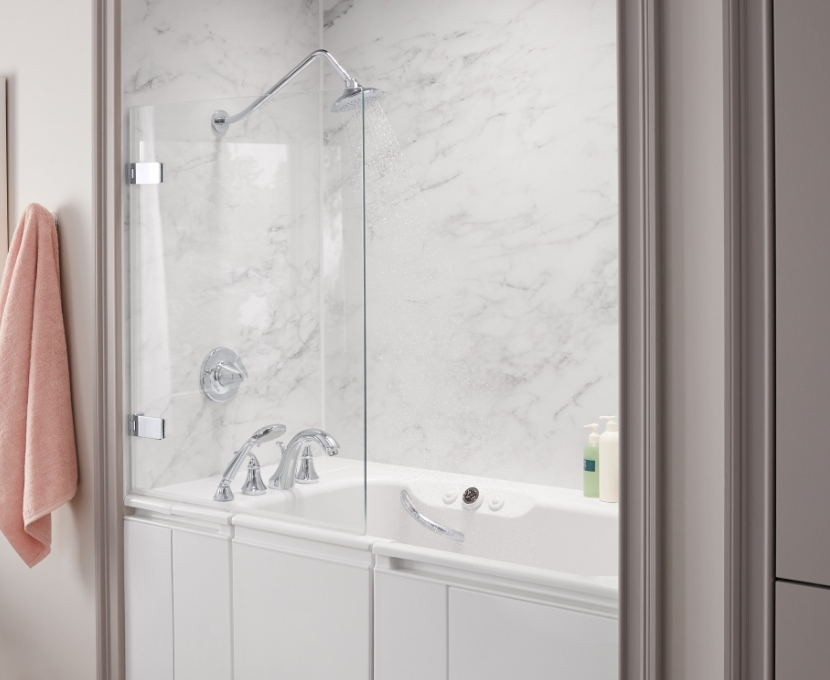 Photo of a specialty walk in tub with a glass partition